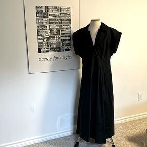 Banana Republic Outlet Black Dress with Flared Skirt.  Size 12.  It has pockets!